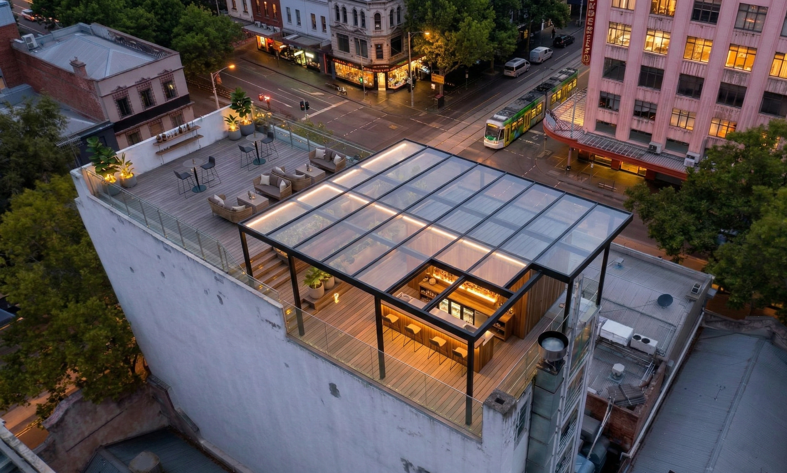 Melbourne CBD rooftop bar concept at dusk with canopy and lounge seating